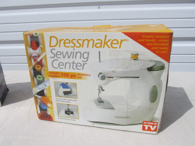 lot 79 image: Brand New DRESSMAKER SEWING CENTER Machine w Accessories 