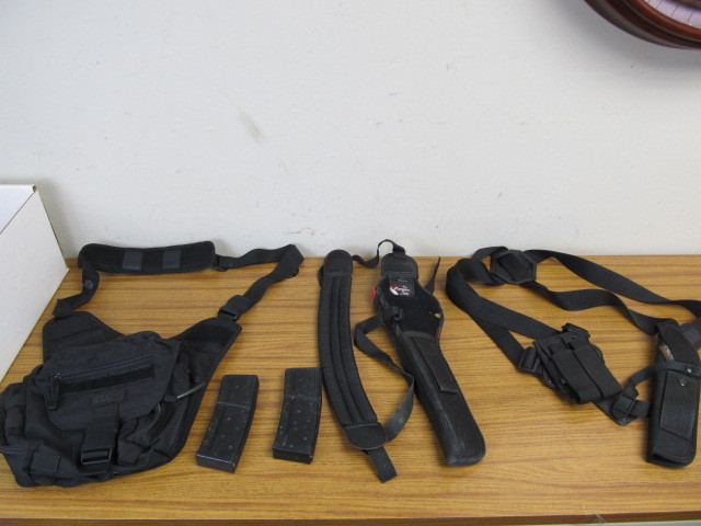 lot 89 image: Lot of Gun Straps Holsters Etc