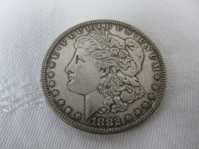 lot 142 image: 1882 Morgan Silver Dollar