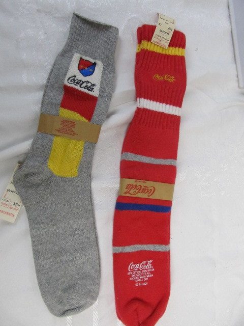 lot 147 image: 2 Pairs of NOS Vintage 1986 Coca Cola Socks