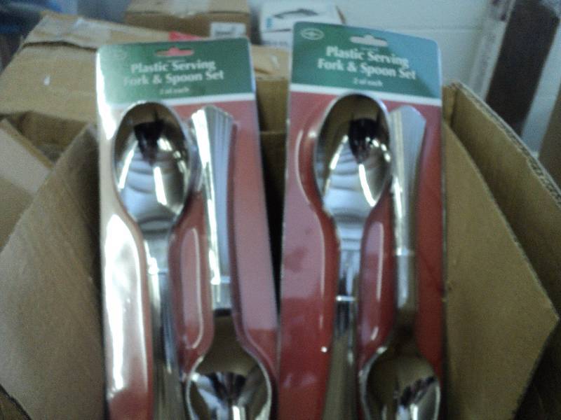 2 sets of plastic serving forks and...