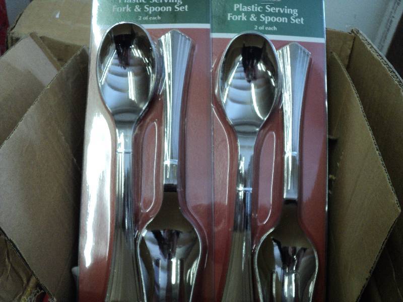 2 sets of plastic serving forks and...