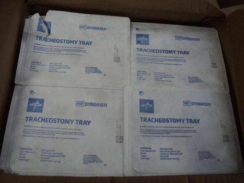 box of trays with gauge and medical...