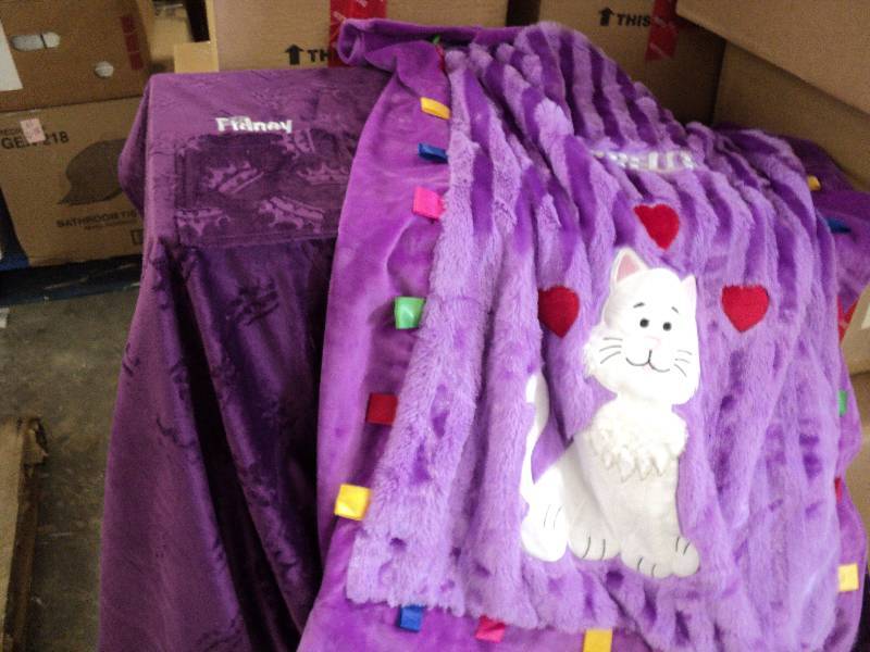 2 purple throws...