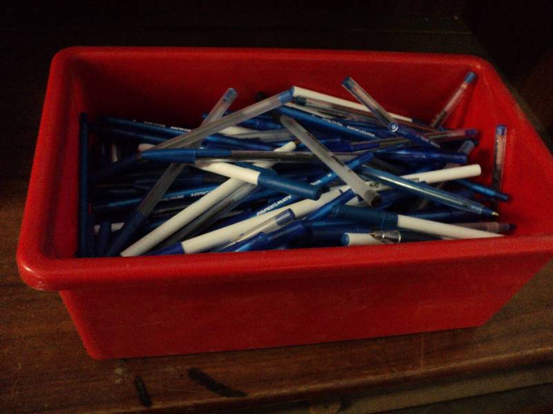 bin full of pens...
