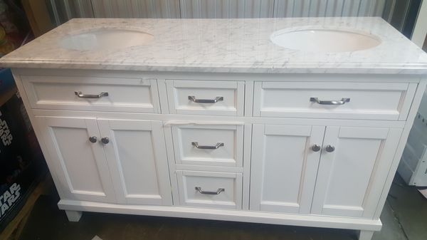 60 DOUBLE VANITY, RETAIL $799.99, STOCK PHOTO. ONE LEG BROKEN