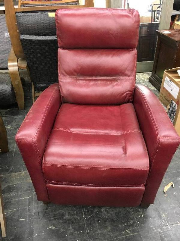 SYNERGY LEATHER RECLINER, RETAIL $399.99. SMALL TEAR