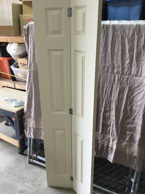 New in Box - Lowes Primed  White Bi-Fold Closet Doors