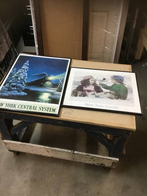 Two Pictures and a Large Frame