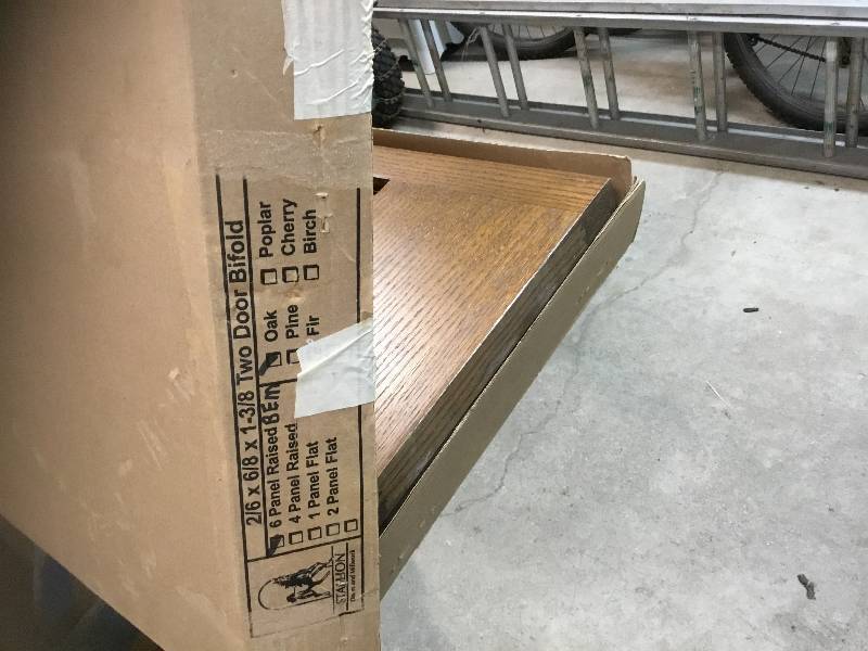 New in Box - Lowes Oak  Bi-Fold Closet Doors