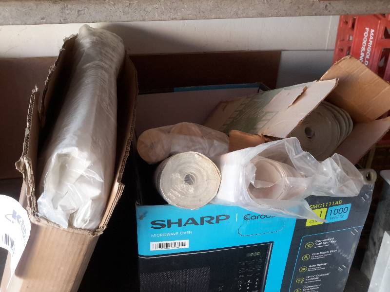 Large lot of wallpaper and a large replacement tarp