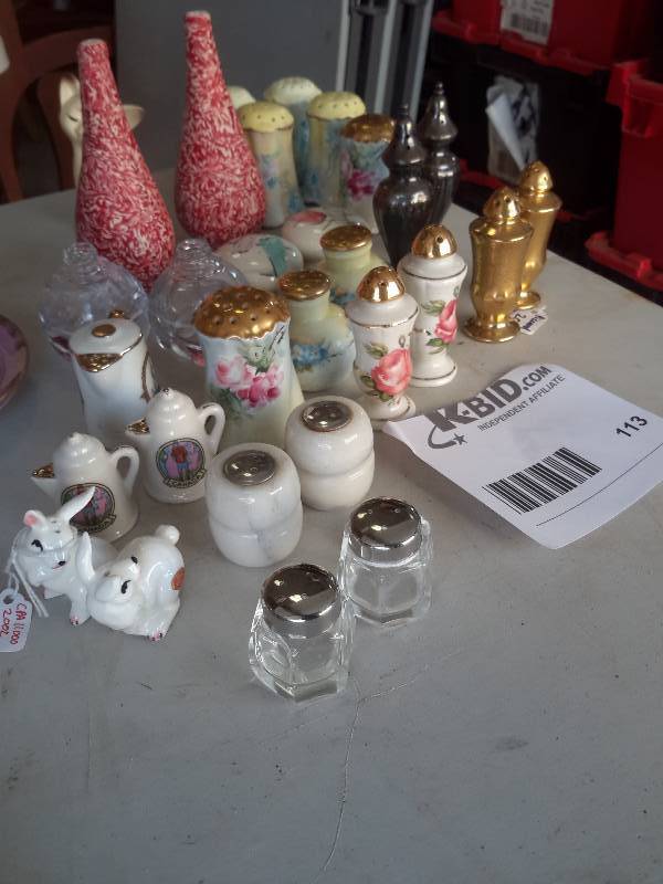Lot of Salt and Pepper Shakers as shown