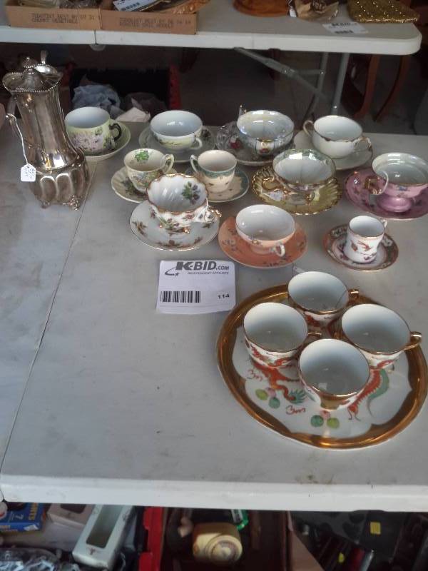 Lot of China Coffee CupsSaucers as shown.. Incluedes Silver plate coffee pot