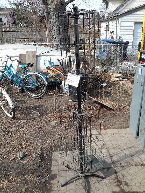 6ft tall, magazine rack. Swivel racks