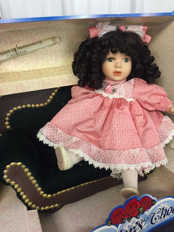 COLLECTORS CHOICE PORCELAIN DOLL ON BENCH