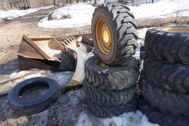 lot 21 image: Set of 4 - Galaxy Brand Super Side Wall Beefy Body Skid Loader Tires and Rims