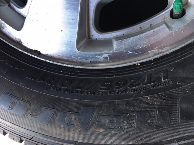 lot 26 image: Set of 4 Hankook Dynapro 17 Truck Tires Mounted on 8 Bolt Chevy Rims