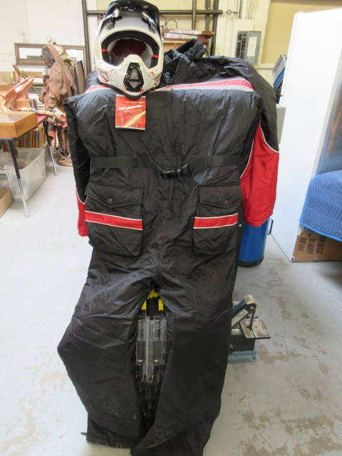 lot 730 image: SNOWMOBILE SUIT AND MOTOCROSS HELMET