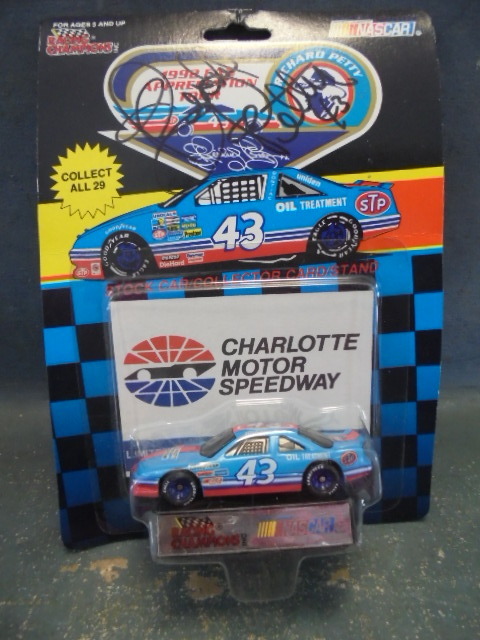 lot 13 image: Autographed Richard Petty Die Cast Car