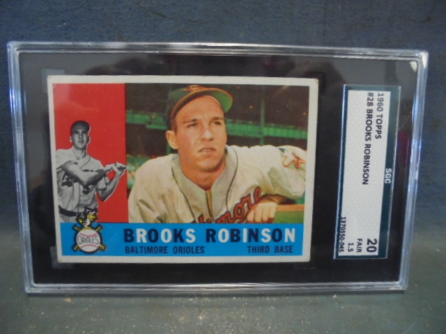 lot 14 image: 1960 Graded and Slabbled Books Robinson Baseball Card