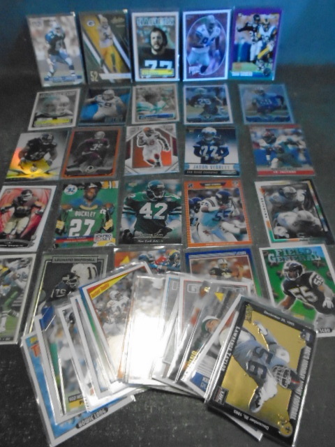lot 72 image: 50 NFL Star Defencive Player Football Cards w Rookies