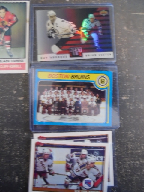 lot 21 image: Hockey Cards with Mike Madano Game Used Jersey Card and More