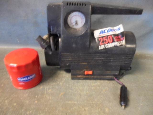 lot 57 image: Portable Air Compressor and Oil Filter