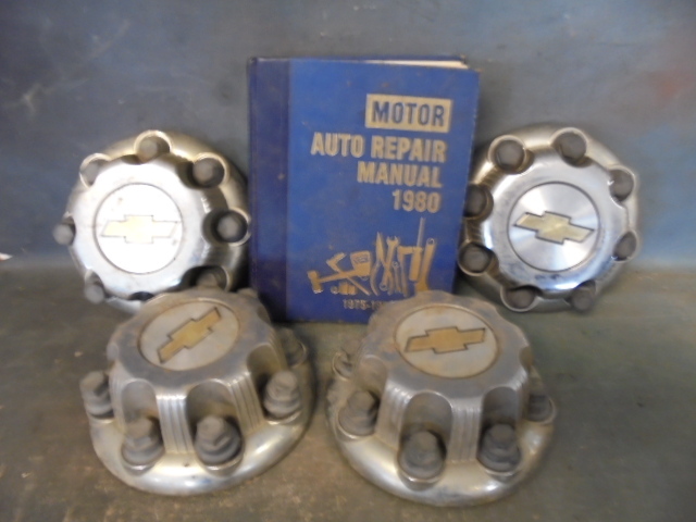 lot 84 image: Chevrolet Center Caps and Repair Manual