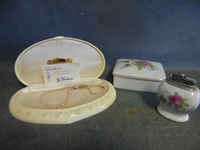 lot 87 image: Vintage Faux Pearls and Lighter Set