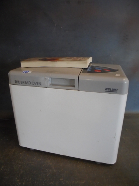 lot 135 image: Bread Maker and Baking Book