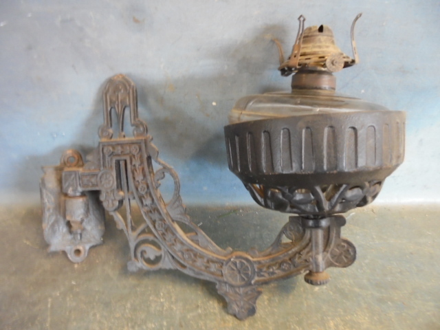 lot 137 image: Vintage Cast Iron Sconce and Oil Lamp