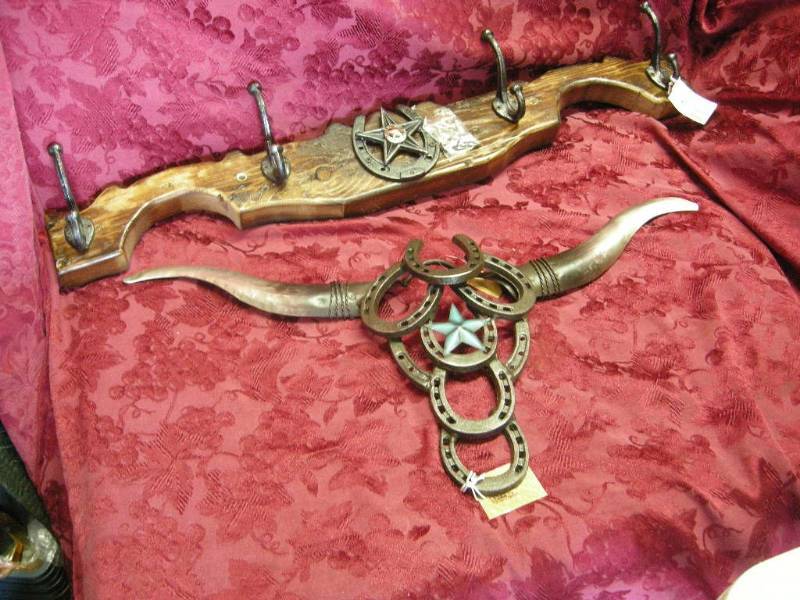 lot 21 image: Star and Horseshoe Hooks and Skull