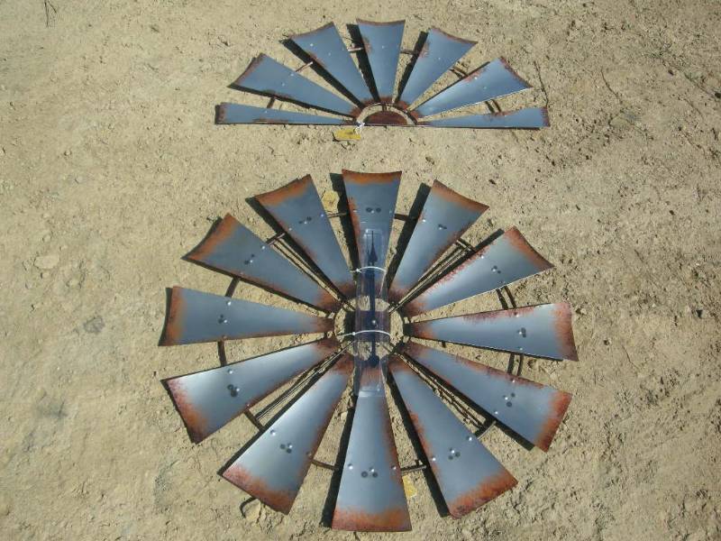 lot 29 image: Metal Windmill Clock and Sign