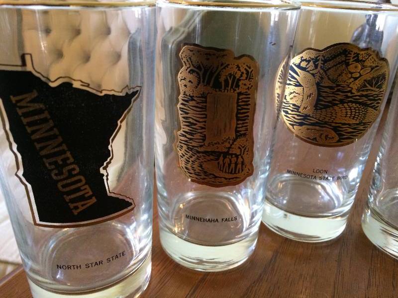 lot 107 image: All About Minnesota Vintage Gold Foil & Black Tumbler Glasses- Set Of 8