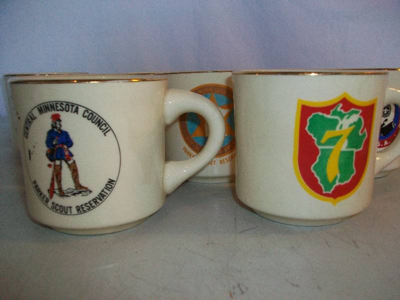 lot 32 image: Vintage Boy Scout Mugs