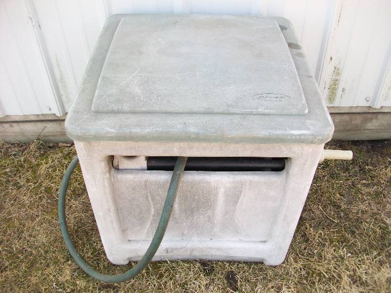 lot 99 image: Garden Hose Reel & Hose