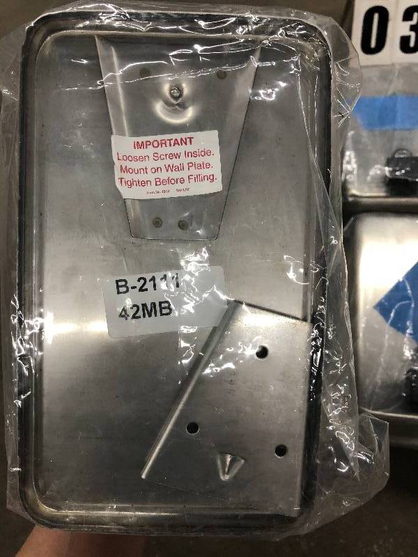 lot 38 image: Lot of (6) Stainless Steel Soap Dispensers