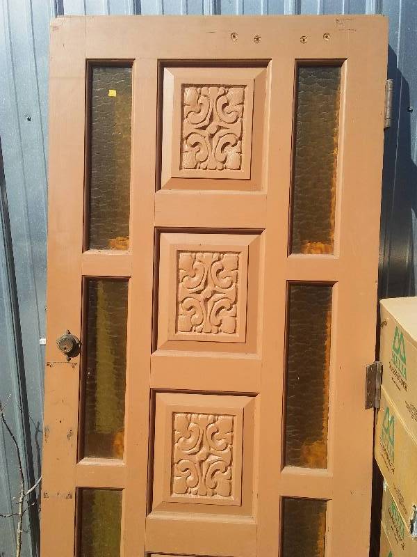 lot 29 image: Carved Door with side lights, 36 x 79  inches