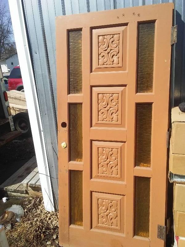 lot 30 image: Carved Door with side lights, 36 x 79  inches