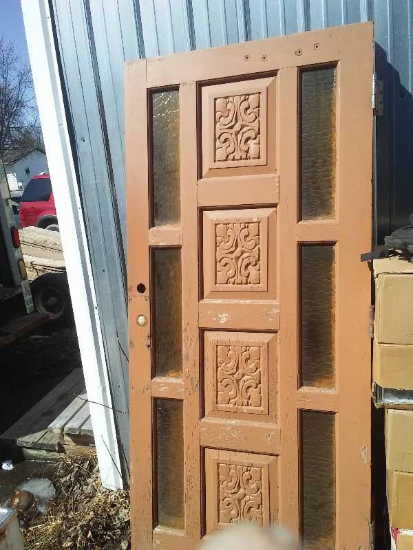 lot 31 image: Carved Door with side lights, 36 x 79  inches