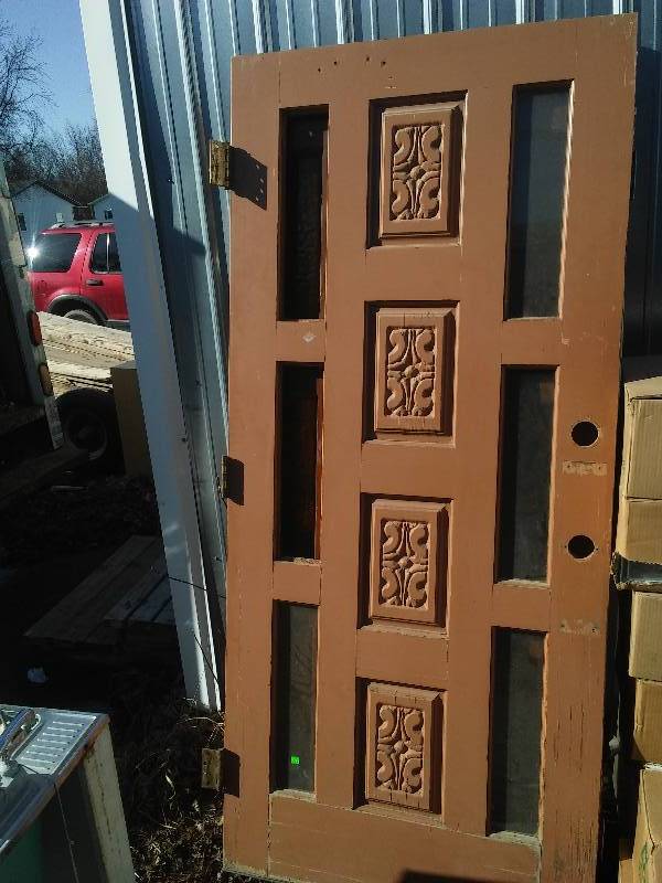 lot 33 image: Carved Door with side lights, 36 x 79  inches