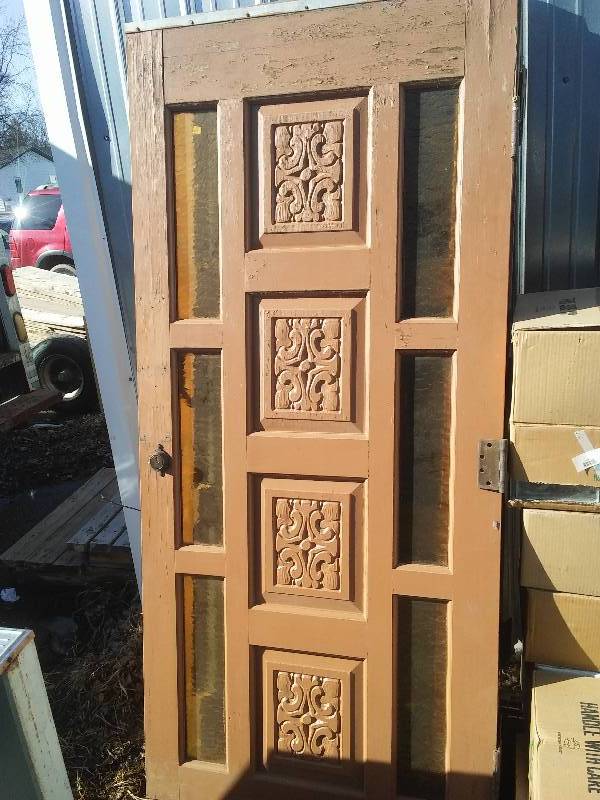 lot 34 image: Carved Door with side lights, 36 x 79  inches