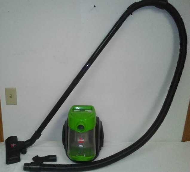 lot 132 image: Bissell Zing Vacuum. Used but clean and works well.