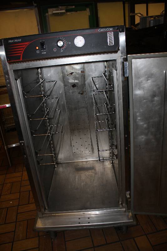 lot 46 image: Cres-Cor, Mod #H137SUA9CS, hot-hold cabinet, caster mounted, 125 volts, 1500 watts, 28x33x52H, complete w5 sheet pans.