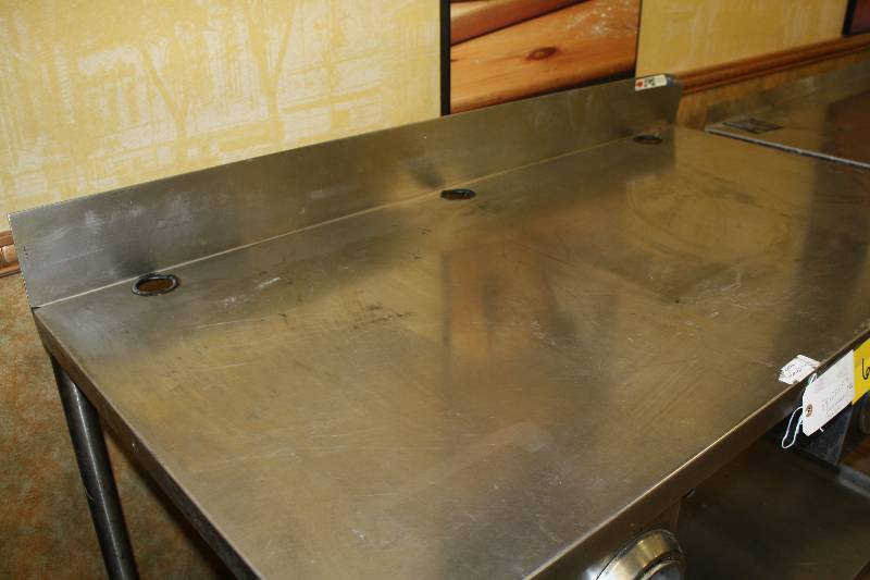 lot 65 image: Stainless steel worktable, cup dispensing tubes, stainless steel under shelf, NSF, 54x28x35.5H w5 back splash