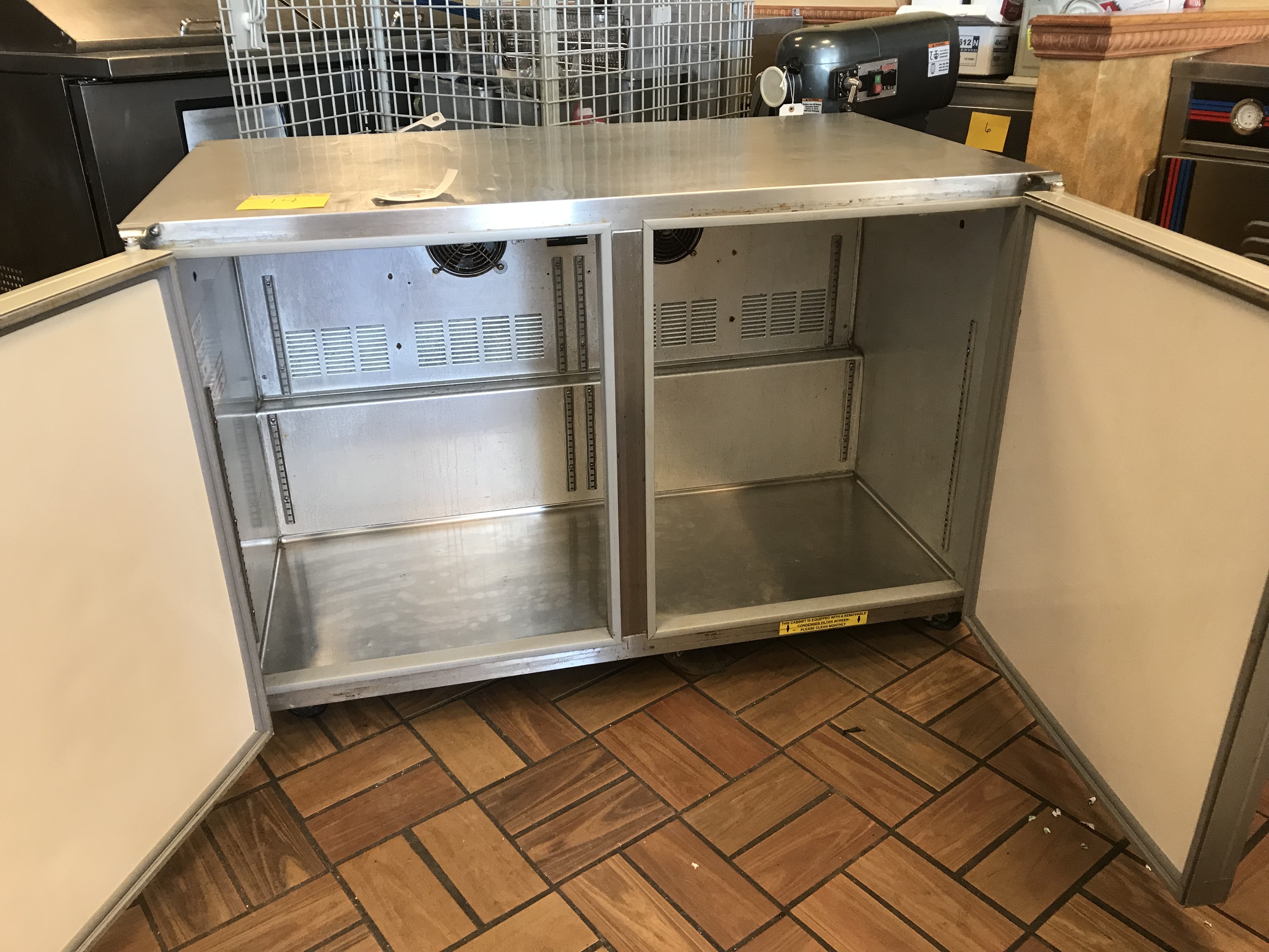 lot 14 image: Silver King 48 Refrigerated Prep Table on Wheels, Model SKP488, 115V- runs Cools