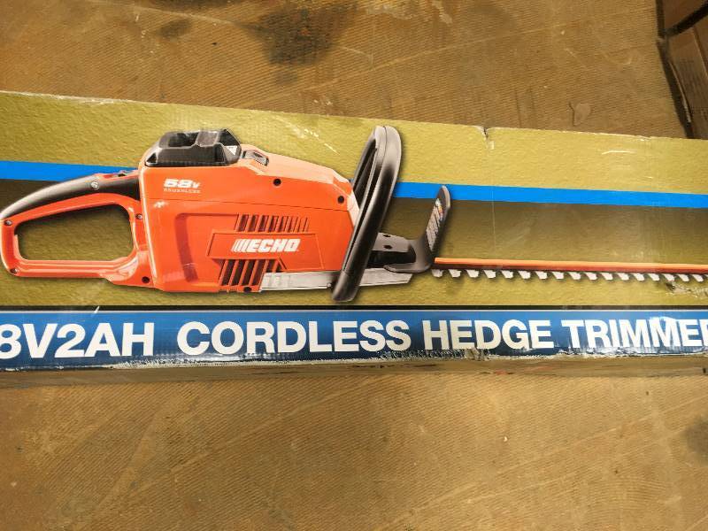 ECHO 24 IN. 58-Volt Lithium-Ion Brushless Cordless Hedge Trimmer- 2.0Ah Battery and Charger Inculded open box not used
