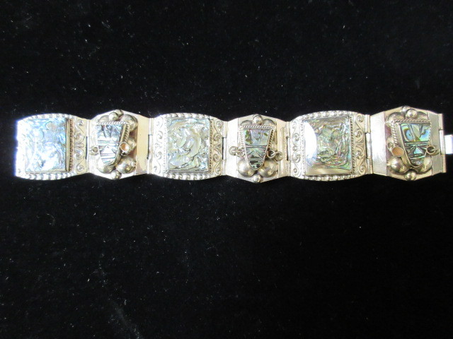 lot 320 image: STERLING ABALONE WARRIOR PANEL BRACELET