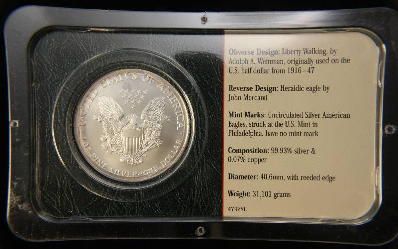 2001 AMERICAN SILVER EAGLE 1 TROY OZ. .999 FINE SILVER IN ORIGINAL SEALED LITTLETON HOLDER
