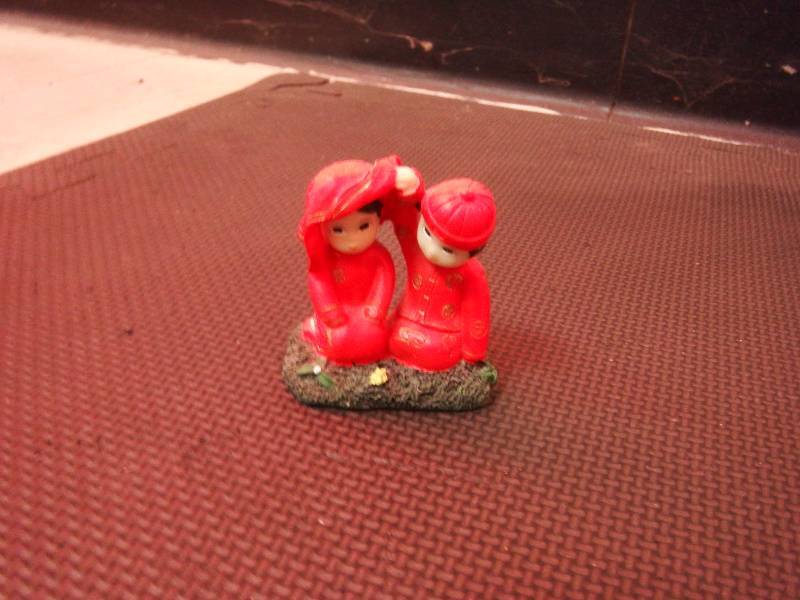 Torii Gate Bell Statue and BoyGirl Statue